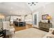 Spacious kitchen with stainless steel appliances, white cabinets, and a large island at 2377 Kesgrove Way, Buford, GA 30518
