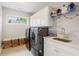Laundry room with cabinets and sink at 2377 Kesgrove Way, Buford, GA 30518