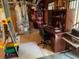 Basement office space with large desk and an open area for a play area at 340 Fountainmist Trl, Lawrenceville, GA 30043