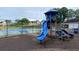 A blue playground set is located next to the tennis courts at 340 Fountainmist Trl, Lawrenceville, GA 30043