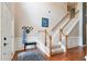 Spacious foyer featuring hardwood floors and a staircase at 5365 Twin Creeks Dr, Norcross, GA 30071