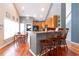Open kitchen features stainless appliances, breakfast bar, and an adjacent dining area at 5365 Twin Creeks Dr, Norcross, GA 30071