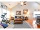 Comfortable living room with vaulted ceilings and a large area rug at 5365 Twin Creeks Dr, Norcross, GA 30071
