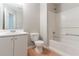 Bathroom with vanity, toilet, and tub/shower combination with neutral tones at 5421 Salem Springs Dr, Lithonia, GA 30038