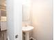 Bathroom featuring a pedestal sink offering a clean and modern aesthetic for a functional and welcoming space at 1851 Harvest Way, Loganville, GA 30052
