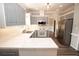 Stylish kitchen featuring gray cabinets, white countertops, and stainless steel appliances at 1851 Harvest Way, Loganville, GA 30052