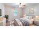 Serene bedroom with natural light and playful decor at 604 Hamlet Se Ct, Conyers, GA 30094