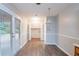 Bright dining area features laminate flooring and double doors leading to the backyard at 604 Hamlet Se Ct, Conyers, GA 30094