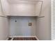 This in-house laundry room contains shelving at 604 Hamlet Se Ct, Conyers, GA 30094