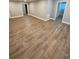 Spacious basement area featuring attractive flooring, neutral walls, and access to other rooms at 2319 Beecher Sw Rd, Atlanta, GA 30311