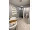 Bathroom featuring marble tile flooring, a walk in shower, and a soaking tub at 2319 Beecher Sw Rd, Atlanta, GA 30311