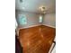 This bright bedroom offers hardwood floors and neutral paint for a modern, spacious feel at 2319 Beecher Sw Rd, Atlanta, GA 30311