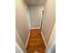 Hallway with hardwood flooring and neutral paint color at 2319 Beecher Sw Rd, Atlanta, GA 30311