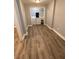 Laundry room with a washer, dryer, and vinyl flooring at 2319 Beecher Sw Rd, Atlanta, GA 30311