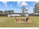Enjoy a firepit and large backyard that makes this home ideal for outdoor entertaining and recreation at 4739 Lower Jersey Rd, Oxford, GA 30054