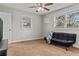 Relaxing bedroom with lots of light and cozy sofa at 4739 Lower Jersey Rd, Oxford, GA 30054