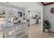 Modern dining area leading to a well-equipped kitchen, ideal for seamless entertaining and everyday living at 4739 Lower Jersey Rd, Oxford, GA 30054