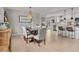 Elegant dining room with chandelier and open layout to the kitchen, perfect for entertaining guests at 4739 Lower Jersey Rd, Oxford, GA 30054