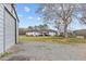 The home offers a large storage building with an additional carport and plenty of room for vehicles at 4739 Lower Jersey Rd, Oxford, GA 30054