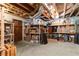 Unfinished basement with ample storage space, shelving, and wood rafters at 1268 Harris Road Rd, Lawrenceville, GA 30043