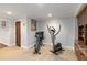 Basement space featuring workout equipment and custom built in cabinets at 1268 Harris Road Rd, Lawrenceville, GA 30043