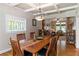 Elegant dining room with coffered ceilings and access to an adjacent living room at 1268 Harris Road Rd, Lawrenceville, GA 30043