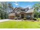 Beautiful two-story home with a landscaped front yard and a spacious two-car garage at 1268 Harris Road Rd, Lawrenceville, GA 30043