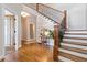 Elegant foyer with hardwood floors, a staircase, and a view of the upper level at 1268 Harris Road Rd, Lawrenceville, GA 30043