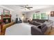 Cozy living room featuring a fireplace, hardwood floors, and comfortable seating at 1268 Harris Road Rd, Lawrenceville, GA 30043