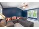 Comfortable living area featuring large sofa, vaulted ceilings and large windows at 1268 Harris Road Rd, Lawrenceville, GA 30043