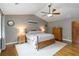 Primary bedroom with wooden floors, vaulted ceilings, and neutral wall color at 1268 Harris Road Rd, Lawrenceville, GA 30043