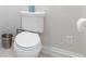 Powder room features low flow toilet and tiled floors at 1268 Harris Road Rd, Lawrenceville, GA 30043