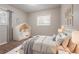 Serene bedroom featuring a plush bed, cozy bed, and soft neutral tones at 1410 Willow Dr, Riverdale, GA 30296
