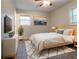 Comfortable bedroom with a plush bed, ample natural light, and stylish decor at 1410 Willow Dr, Riverdale, GA 30296