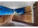 Enclosed back porch with wood floors, a weathered ceiling, and exposed wood at 1550 Bells Ferry Rd, Marietta, GA 30066
