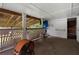 Covered back porch with an open design, offering outdoor relaxation space at 1550 Bells Ferry Rd, Marietta, GA 30066