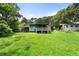 Spacious backyard with a wooden deck and sheds at 1550 Bells Ferry Rd, Marietta, GA 30066