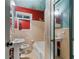 Compact bathroom with a pedestal sink, toilet, and tub with a shower at 1550 Bells Ferry Rd, Marietta, GA 30066