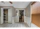 Empty bedroom with tile floors, a ceiling fan, a closet, and natural light at 1550 Bells Ferry Rd, Marietta, GA 30066
