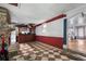Living room features a stone fireplace, wet bar, and tiled floors, perfect for entertaining at 1550 Bells Ferry Rd, Marietta, GA 30066