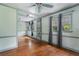 Cozy living room with hardwood floors, decorative molding, and windows at 1550 Bells Ferry Rd, Marietta, GA 30066