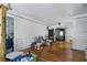 Spacious living room with hardwood floors, ceiling fan, and an arched entryway to an adjoining room at 1550 Bells Ferry Rd, Marietta, GA 30066