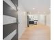 A modern entryway leads to the kitchen and open living area in the house at 3052 Brook Dr, Decatur, GA 30033
