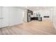 Open concept living area featuring modern kitchen and hardwood floors throughout the house at 3052 Brook Dr, Decatur, GA 30033