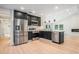 Modern kitchen features stainless steel appliances, sleek cabinets, and an open design at 3052 Brook Dr, Decatur, GA 30033