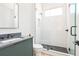 Modern bathroom with herringbone shower, sleek vanity, and contemporary fixtures for a luxurious feel at 3117 Robinson Ave, Scottdale, GA 30079