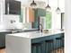 Bright kitchen island with modern appliances and sleek finishes, creating a perfect space for cooking and entertaining at 3117 Robinson Ave, Scottdale, GA 30079