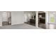 Spacious living room open to the kitchen, featuring modern finishes and natural light at 7099 Skippingstone Way, Douglasville, GA 30134
