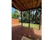 Partially shaded backyard with black fence at 776 Woodstock Grove Dr, Woodstock, GA 30188