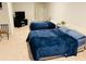 Spacious bedroom featuring comfortable bedding, carpeted floors, and neutral colors, with ample space to relax at 776 Woodstock Grove Dr, Woodstock, GA 30188